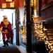 Ann Arbor Santa Claus Danny Maier walks through the back entrance of Conor O'Neill's on Sunday. Daniel Brenner I AnnArbor.com